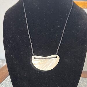 Elegant Black cord necklace with abalone shell. Gold claw clasp